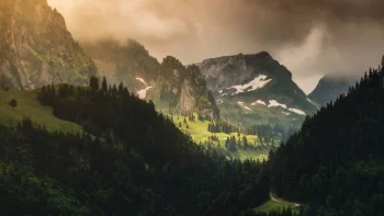 sunbeams on the slopes of the alps, alps, clouds, fir trees, coniferous trees, forest, forests, landscapes, mountains, peaks, hills, roads, highways, motorways, avenues, driveways, passageways, snow, valleys, nature, world