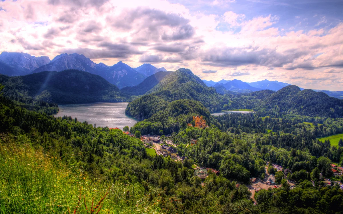 hohenschwangau castle, surrounded by the alps, alps, castles, clouds, forest, forests, lakes, bodies of water, landscapes, mountains, peaks, hills, villages, settlements, nature, world