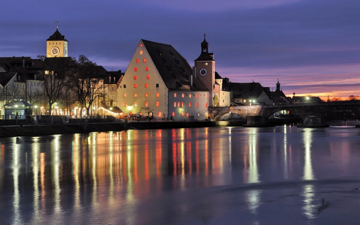 reflection of the salzstadel salt warehouse in the waters of the danube, regensburg, bridges, cities, city, cityscape, cityscapes, germany, morning, night lights, lights, streetlights, street lamps, lighting, night, reflections, rivers, canals, streams, sun, sun rays, sunlight, rays, sunrises, dawn, waterfronts, marinas, architecture, world