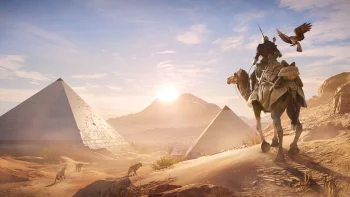 A rider on a camel against the backdrop of the Egyptian pyramids