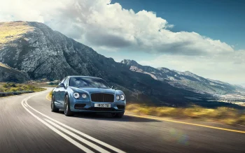 блакитний bentley flying spur на звивистій гірській дорозі, 2017 bentley flying spur w12 s, bentley, бентлі, гори, вершини, пагорби, дороги, шляхи, траси, шосе, магістралі, автостради, проспекти, проїзди, машини, автомобілі, небо, пейзажі, рух, фари, хмари, швидкість, авто