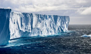 a massive iceberg in antarctic waters, antarctica, arctic, clouds, glaciers, ice, ices, icebergs, landscapes, ocean, oceans, pacific ocean, winter, winters, nature, world