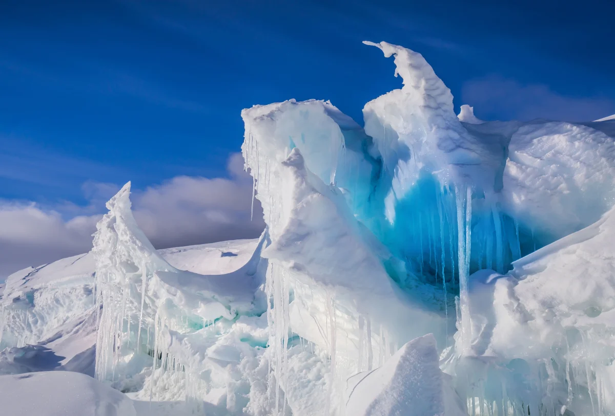 The glow of ice ridges under the clear Arctic sky
