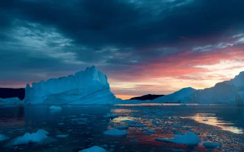 an iceberg bathed in the glow of the sunset in arctic waters, antarctica, arctic, clouds, evening, evenings, twilight, dus, glaciers, ice, ices, icebergs, landscapes, ocean, oceans, pacific ocean, reflections, sky, sunsets, sunset, nature, world