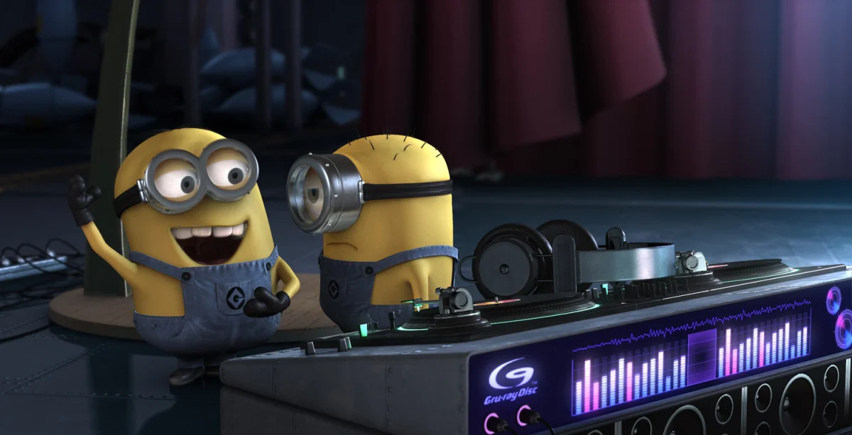 Minions at the DJ booth in the dim light