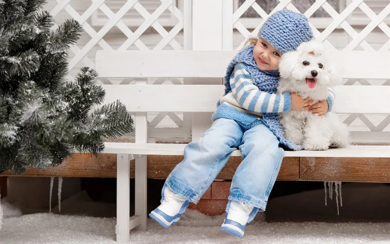 hugging a bichon frise on a bench, children, dogs, for kids, hats, winter, winters, other, people