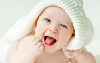 a baby wearing a knitted hat, babies, children, emotions, for kids, hats, smiles, other, people