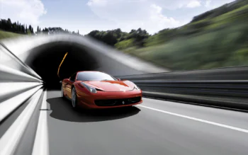 A red Ferrari 458 Italia emerging from a tunnel