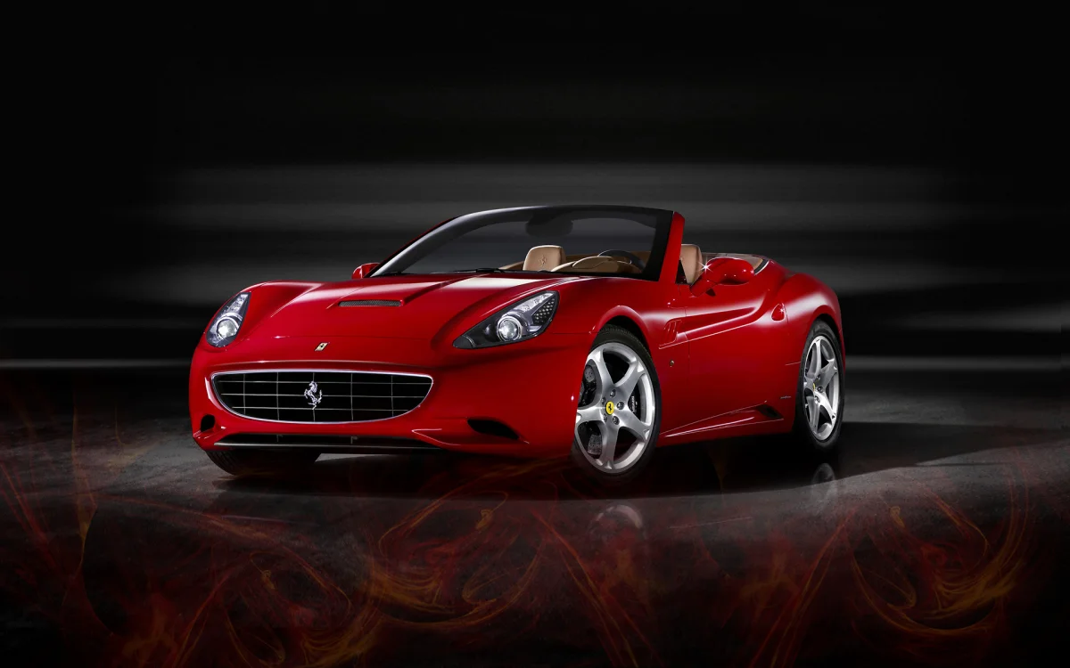 Красный Ferrari California в студийном свете