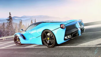A blue Ferrari LaFerrari on a mountain road