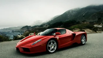 a red ferrari enzo against the backdrop of a foggy coastline, ferrari enzo, california, cars, automobiles, discs, wheels, ferrari, fog, landscapes, mountains, peaks, hills, ocean, oceans, pacific ocean, roads, highways, motorways, avenues, driveways, passageways, sports cars, supercars, hypercars, usa, united states, auto, vehicles