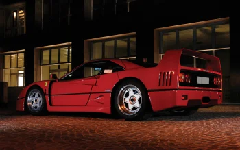 a ferrari f40 against the backdrop of a building at night, ferrari f40, cars, automobiles, discs, wheels, ferrari, houses, buildings, night lights, lights, streetlights, street lamps, lighting, night, sports cars, supercars, hypercars, auto, vehicles
