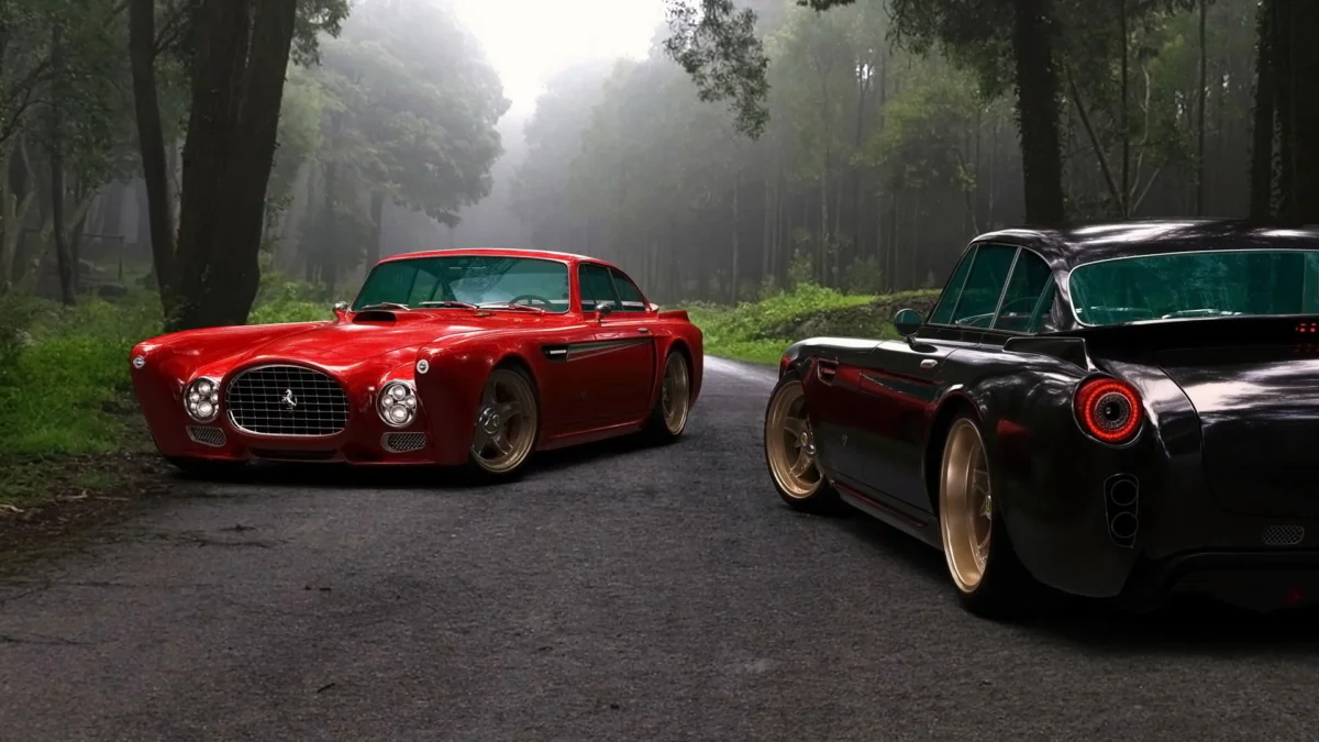 Two Ferrari sports cars on a foggy forest road