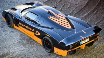 The Gumpert Apollo race car on a gravel surface