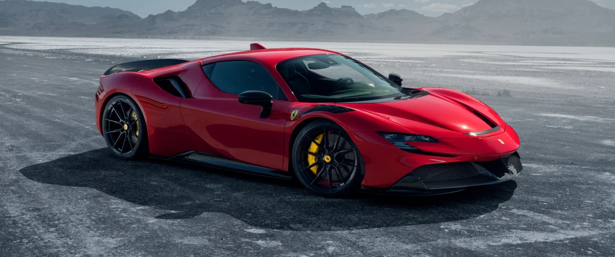 A red Ferrari SF90 Stradale against the backdrop of a salt desert