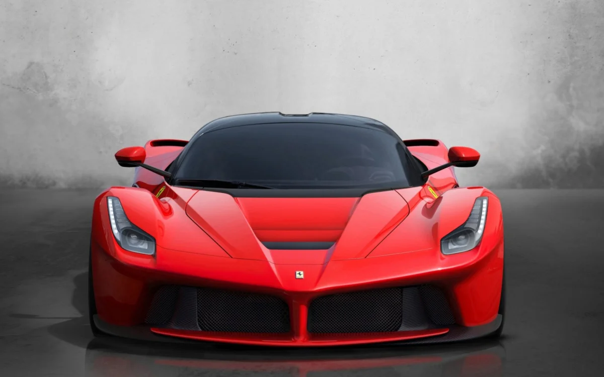 The red Ferrari LaFerrari hypercar under studio lighting