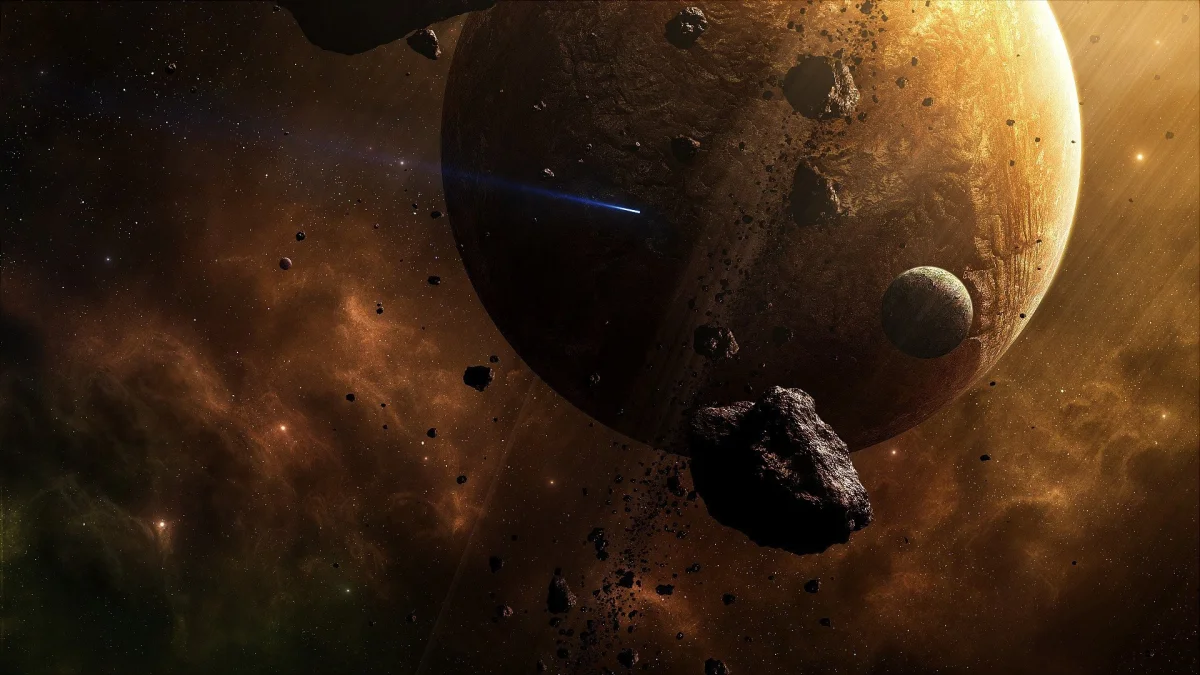 A golden planet surrounded by asteroids
