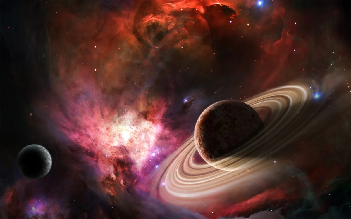 The planet Saturn surrounded by bright nebulae