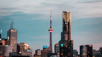 the silhouette of the cn tower against the backdrop of toronto at dusk, toronto, canada, cities, city, cityscape, cityscapes, clouds, evening, evenings, twilight, dus, night lights, lights, streetlights, street lamps, lighting, night, skyscrapers, architecture, world