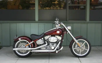a burgundy harley-davidson rocker parked against the wall of a café, harley-davidson rocker, cruiser motorcycles, cruisers, american classic motorcycles, discs, wheels, harley-davidson, motorcycles, bikes, harley davidson, technology