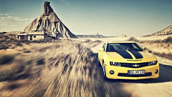 Желтый Chevrolet Camaro на фоне пустынных скал