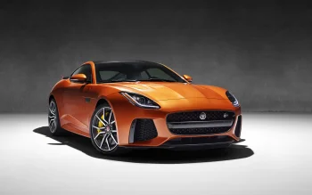 Помаранчевий Jaguar F-Type SVR у студійному освітленні