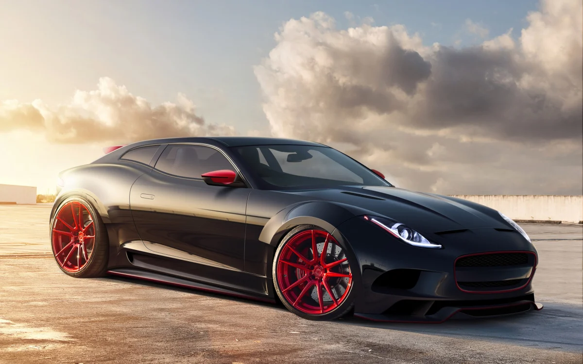 Чорний Jaguar XC16 з червоними дисками на парковці