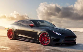 Чорний Jaguar XC16 з червоними дисками на парковці