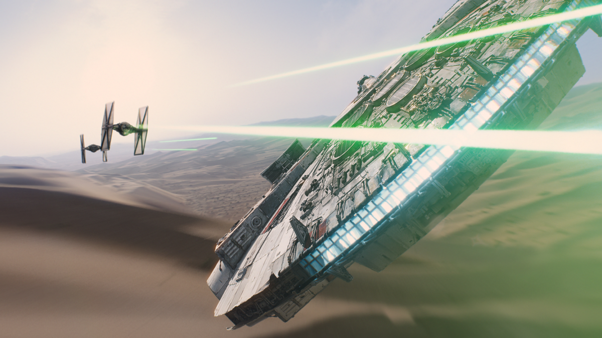 The Millennium Falcon escapes pursuit by TIE fighters over the Tatooine desert