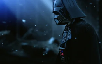 Darth Vader, deep in thought, amidst falling snow