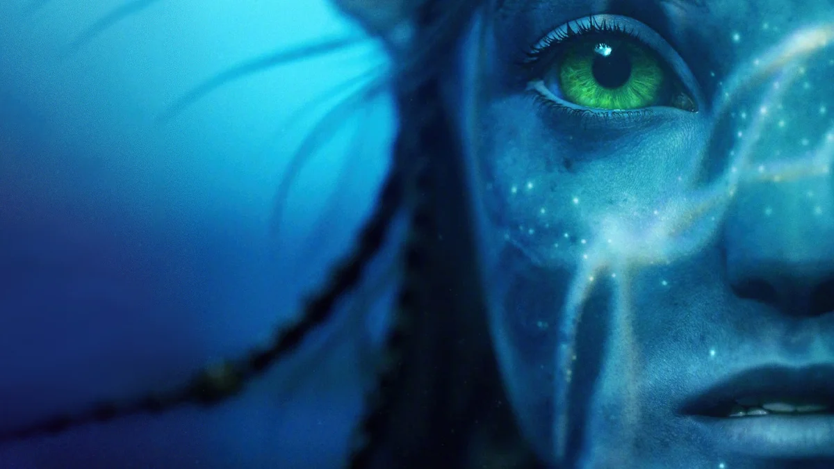 Neytiri's piercing gaze in the blue glow of Pandora