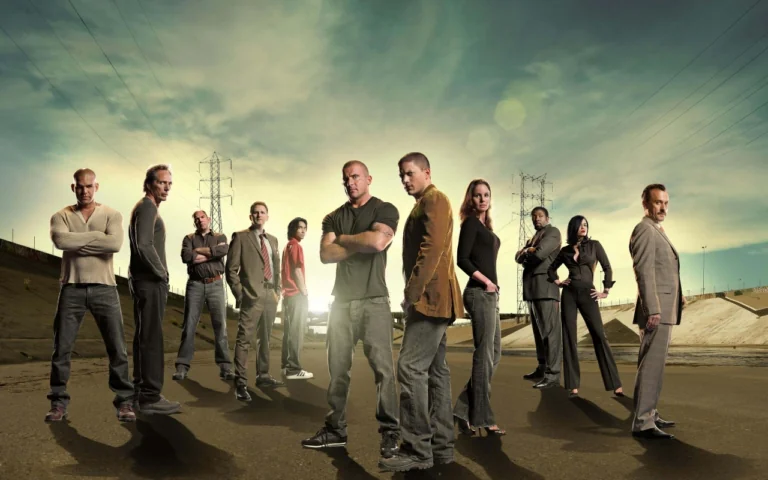 The cast of the series "The Escape" against the backdrop of an industrial landscape