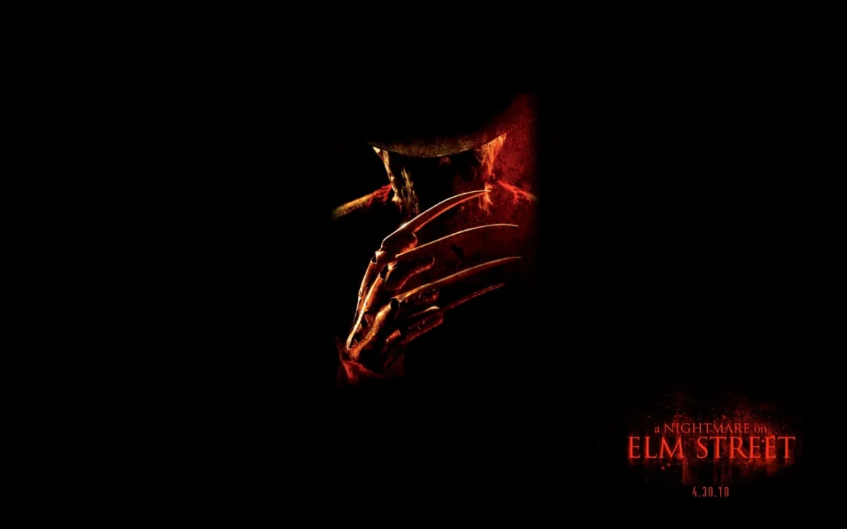 The sinister silhouette of Freddy Krueger in red light