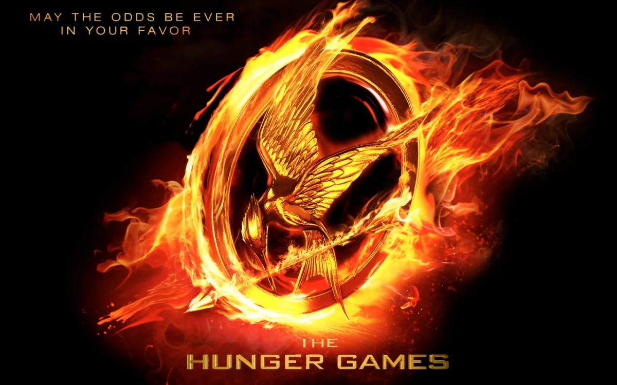 The Golden Mockingjay in flames on the poster for "The Hunger Games"