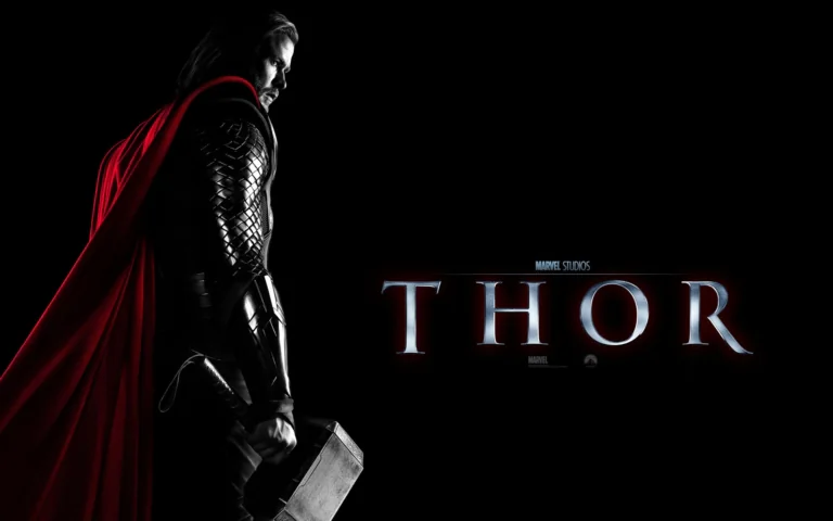 Chris Hemsworth as Thor with the hammer Mjölnir against a dark background