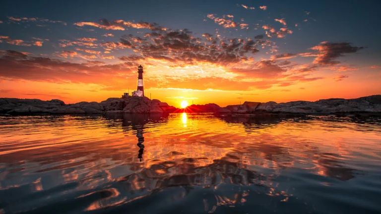The Langesunn Lighthouse against the backdrop of a blazing sunset in Norway