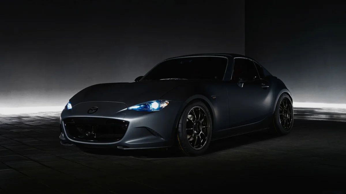 A Mazda MX-5 in the glow of the backlight