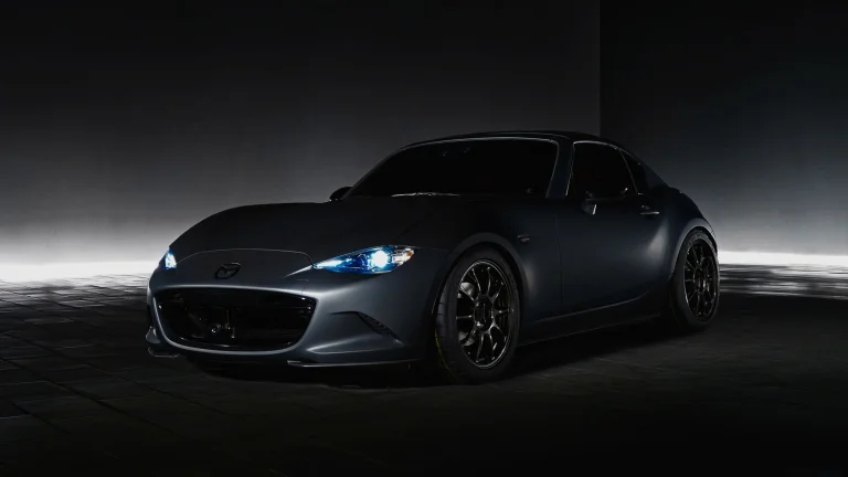 A Mazda MX-5 in the glow of the backlight