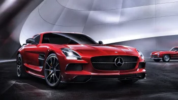 A red Mercedes-Benz SLS AMG in a modern showroom