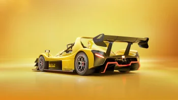 Желтый спорткар Radical SR3 XXR на однотонном фоне