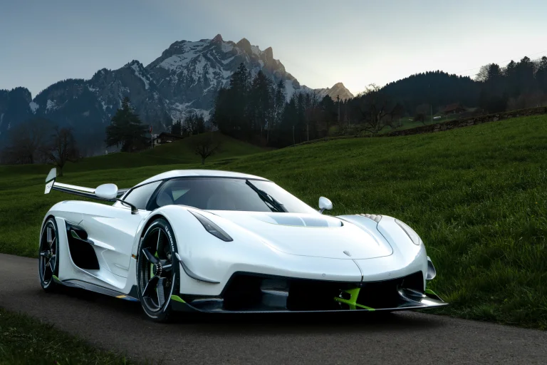 a snow-white koenigsegg jesko against the backdrop of the snow-capped alps, koenigsegg jesko, alps, cars, automobiles, herb, herbs, lawns, koenigsegg, landscapes, mountains, peaks, hills, roads, highways, motorways, avenues, driveways, passageways, supercars, hypercars, auto, vehicles