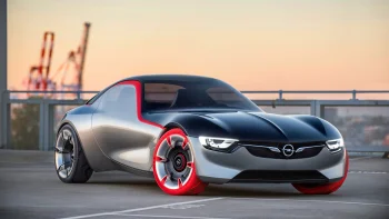 the opel gt concept car against the backdrop of a sunset sky, opel gt, cars, automobiles, discs, wheels, evening, evenings, twilight, dus, headlights, opel, sunsets, sunset, auto, vehicles