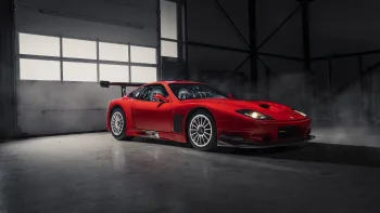 a red ferrari 550 gt in the dim light of the garage, ferrari 550 gt, cars, automobiles, discs, wheels, ferrari, interiors, sports cars, auto, vehicles