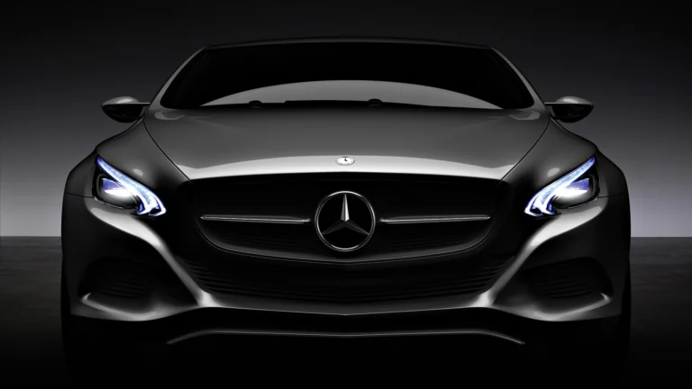 The stern gaze of a Mercedes-Benz in the twilight