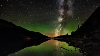 the milky way above the mirror-like surface of a mountain lake, galaxies, lakes, bodies of water, landscapes, milky way, mountains, peaks, hills, nebulae, night lights, lights, streetlights, street lamps, lighting, night, reflections, sky, stars, space, the universe, astronomy, planets, earth, the sun