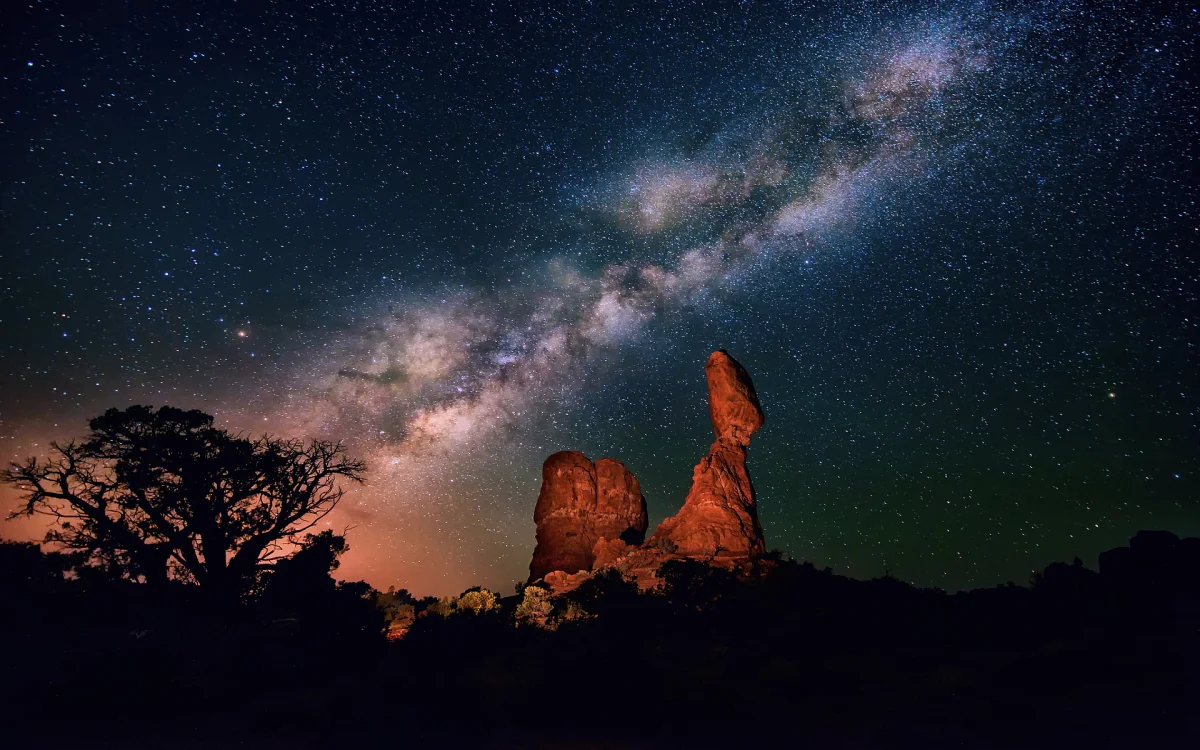 The Milky Way over Balancing Rock in the United States
