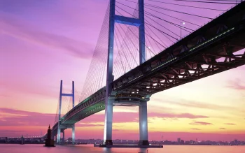 yokohama bay bridge in japan at sunset, yokohama, japan, bridges, cityscape, cityscapes, clouds, evening, evenings, twilight, dus, night lights, lights, streetlights, street lamps, lighting, night, rivers, canals, streams, sky, sunsets, sunset, architecture, world