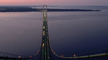 the lights of the makino bridge at dusk over a strait in the u.s., makino bridge, michigan, bridges, engineering marvel, engineering structures, evening, evenings, twilight, dus, lakes, bodies of water, landscapes, night lights, lights, streetlights, street lamps, lighting, night, roads, highways, motorways, avenues, driveways, passageways, sunsets, sunset, usa, united states, architecture, world