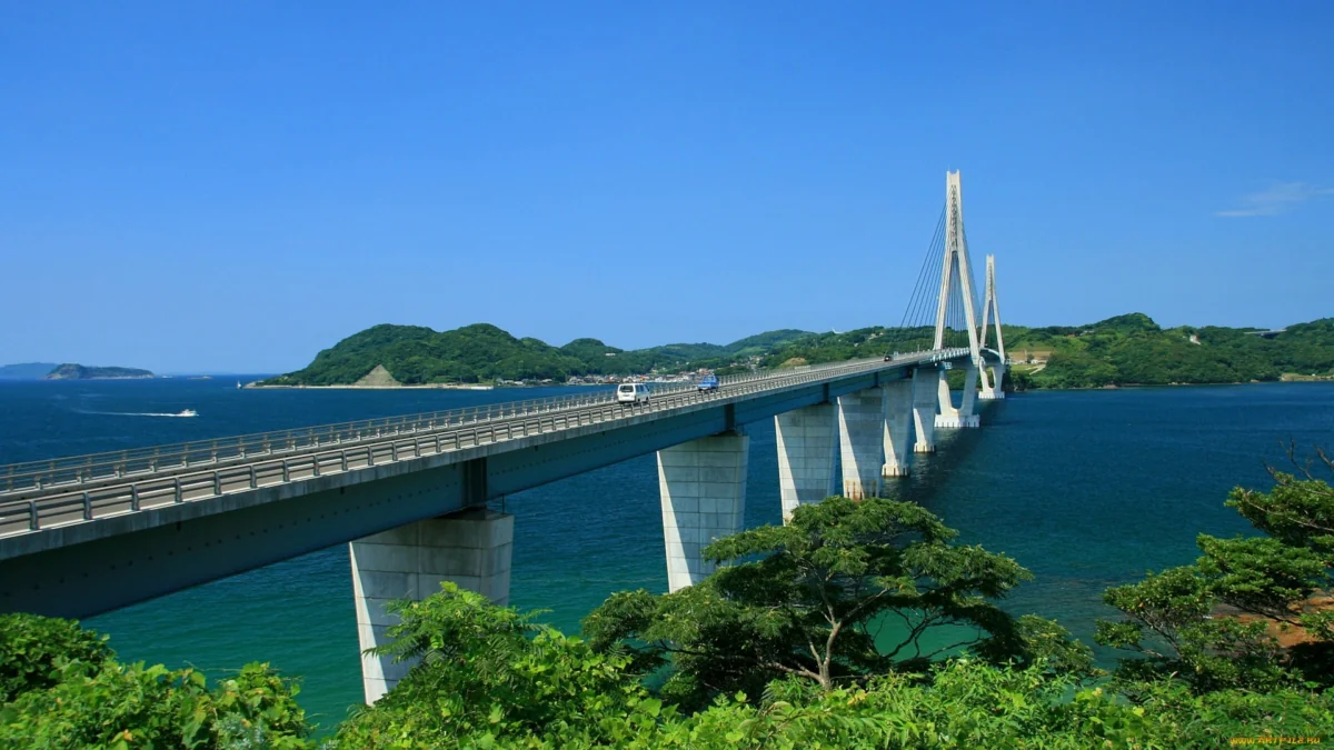 The Ikuti Cable-Stayed Bridge spanning the azure waters of the Gulf of Japan