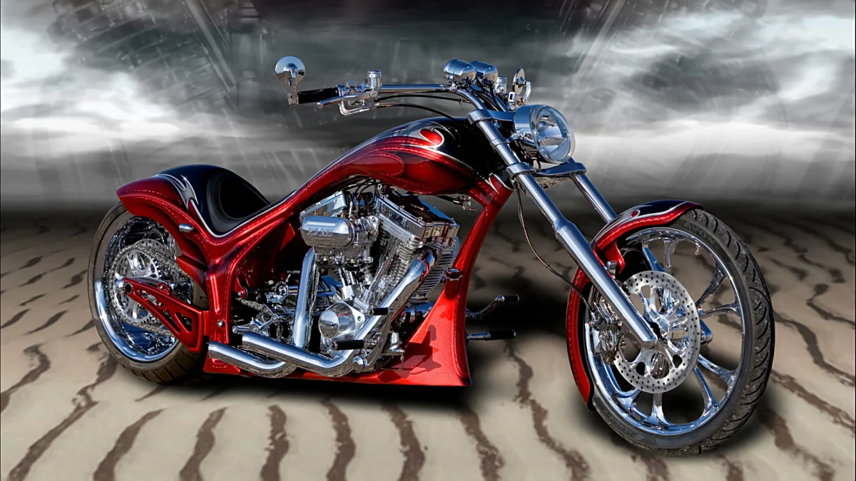 A red custom motorcycle against an abstract background
